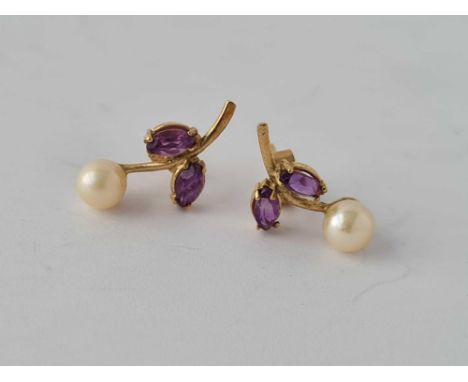 A pair of amethyst and pearl ear studs 9ct
