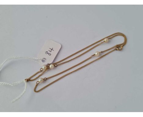A gold and pearl necklace 9ct 15 inch