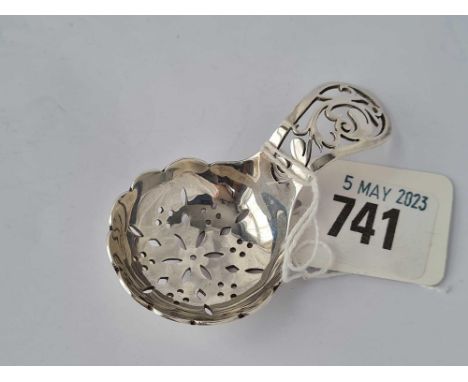 A caddy spoon with pierced handle and bowl, London 1946