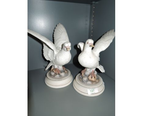 Two vintage ceramic dove figures by Akita