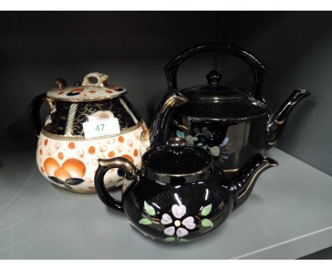 A selection of vintage ceramic tea pots including Crown Derby style 