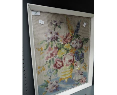 A vintage needle work tapestry depicting retro flower bowl
