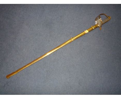 A MILITARY SWORD, marked Henry Wilkinson Pall Mall, London, marked on blade H.F. Davies, brass scabbard