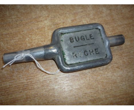 AN ALLOY SINGLE LINE KEY TOKEN BUGLE-ROCHE, from the Par-Newquay branch, ex box condition with traces of green paint, end rem