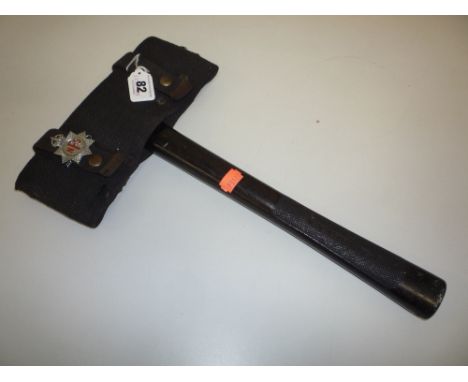 A NATIONAL FIRE SERVICE AXE, from the 1940's complete with pouch and NFS badge, marked PRO. PAT. 19242-38