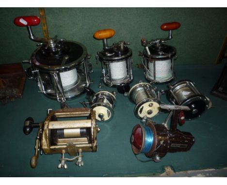 A COLLECTION OF THREE PENN SENATOR SEA FISHING REELS, (2 x9/0, 1 x 14/0), two Garcia Mitchell casting reels (6oz AP and 624),