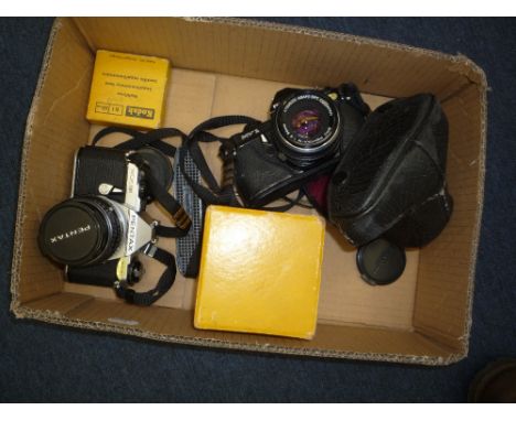 A PENTAX ME-SUPER SLR CAMERA. With 50mm 1:2 lens, a Pentax MV-1 with 50mm 1:2 lens and case and  Schneider 135mm 4 lens