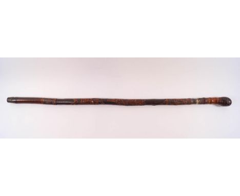An early 20th century Japanese swordstick within a bamboo shaft, carved with warriors