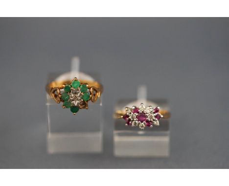 A hallmarked 9ct gold ruby and CZ dress ring together with a hallmarked 9ct gold emerald and diamond dress ring (one emerald 