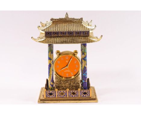 A Pagoda style clock, with gilt and cloisonne decoration, 8 day, 15 jewel movement, with alarm, 20cm high