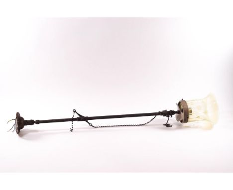 A late Victorian/early 20th century vaseline glass gas lamp shade, 80cm high