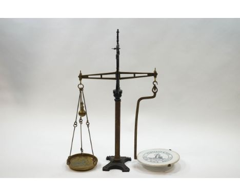 A Parnall Bristol Patent 'Agate' Balance grocers scales, in brass and cast iron, with round earthenware weighing plate transf