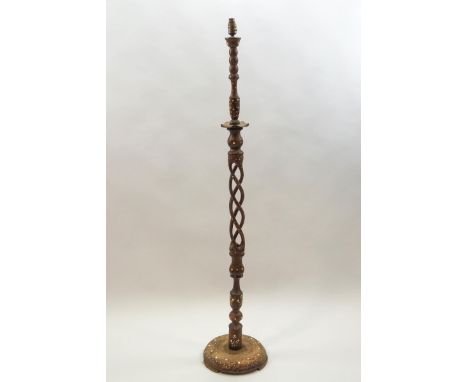 A Middle Eastern turned wood standard lamp with bone flower and line inlay decoration, 162cm high