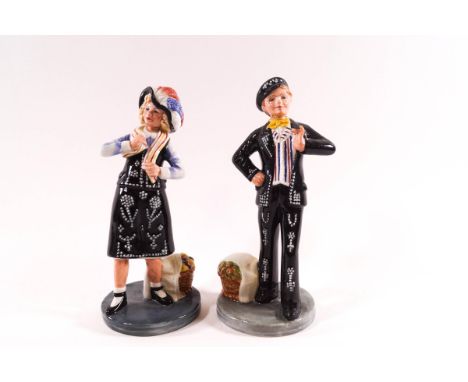 A pair of Royal Doulton figures: Pearly Boy HN2767 and Pearly Girl HN2769, modelled by William K Hanfer, 20cm high