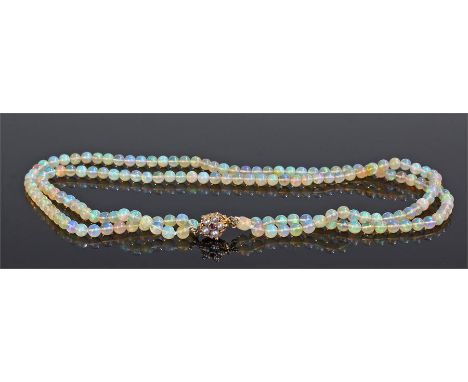 Opal amethyst and pearl necklace, the two strung opal bead necklaces with amethyst and pearl clasp