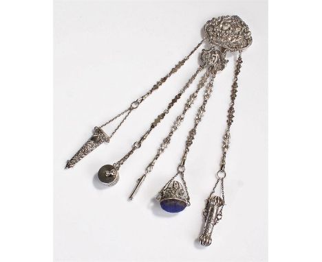 Victorian silver chatelaine, the belt hook and chains London 1888, maker CM, with a scene showing figures drinking and eating