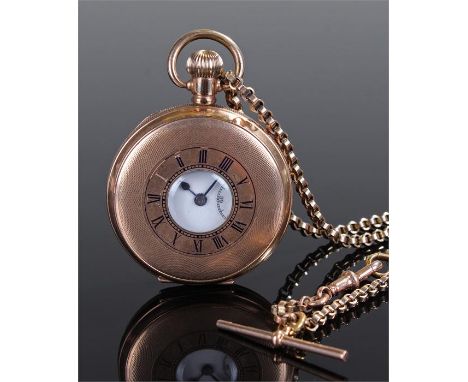 Gold plated half hunter pocket watch and a 9 carat gold watch chain. The gold plated half hunter with outer blue enamel dial,