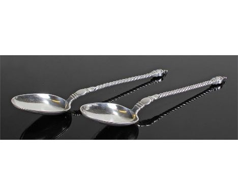 Pair of Danish silver spoons maker Funck. The finial tops with a portrait face to the front and back, barley twist stem with 