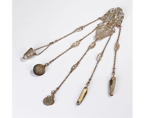 Silver chatelaine, with fret pierced leaf clip top above drop chains and various tools attached (some later) 35cm long