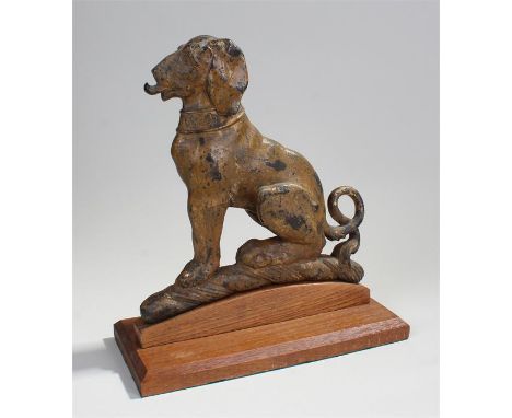 Rare late 18th Century gilt bronze heraldic dog, with a fleur de lis collar, tongue out and seated on a plinth, 26cm long