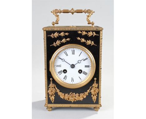 Late 19th Century French ormolu mounted mantel clock. The ebonised case with gilt ormolu mounts, a white enamel dial with Rom