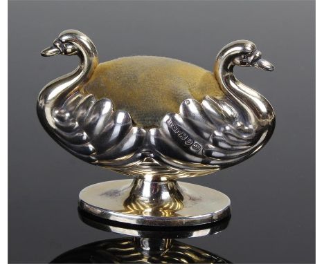 Victorian silver novelty pin cushion, Birmingham 1876, maker Hilliard & Thomason, modelled as two swans on a plinth base, 70m