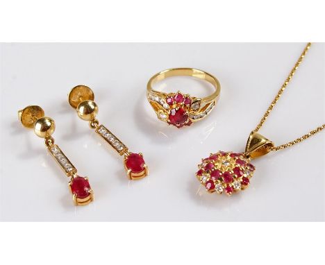 18 carat gold ruby and diamond jewellery set, consisting of a ring set with a central ruby and diamond shoulders, a pair of d