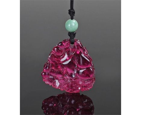 Large and impressive Chinese tourmaline and jade carved pendant, the tourmaline at approximately 124 carats carved with flowe