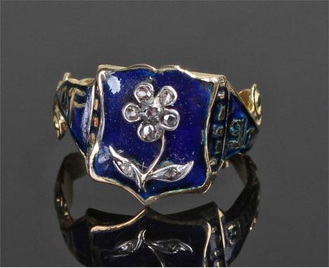Victorian mourning ring, the diamond set head in the form of a flower with deep blue enamel ground with text to the swag shou