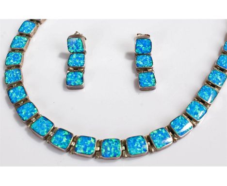 Opal and silver jewellery set, to include a necklace set with opal panels, together with a pair of conforming earrings, (3)