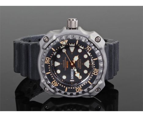 Citizen Professional diver 1300m. The base titanium case with outer chapter ring, black dial with white dot hours, day date a