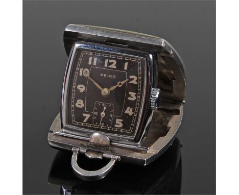 Seiko silver and enamel purse/travelling watch, the outer silver case with green enamel enclosing a black signed dial with Ar