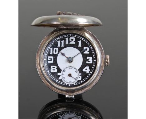 Trench wristwatch, the silver hunter case enclosing a black and white dial with subsidiary seconds dial, manual wound, case 3