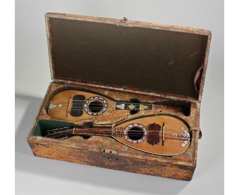 A pair of Neopolitan Mandolins attributed to Antonio Vinaccia circa 1764,
labelled in one only, Antonio Vinaccia, filius Janu