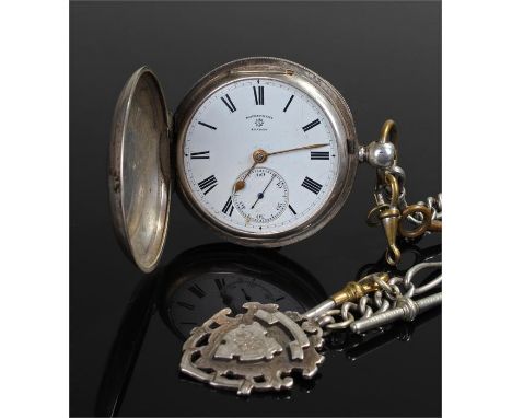 Silver hunter pocket watch and chain, the silver case enclosing a white signed enamel dial with black Roman hours, subsidiary