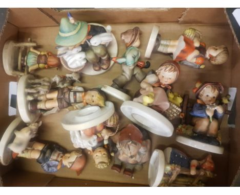 A Collection of Eleven Goebel Hummel Figures 