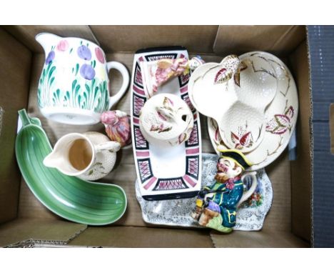 A mixed collection of items to include Bristol hand decorated jug, Wade Toby jug &amp; raised relief jug, lidded pot &amp; pl