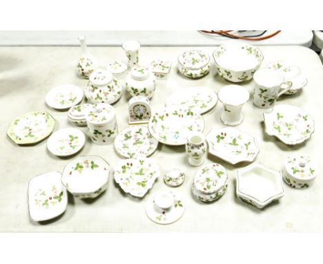 A collection of Wedgwood Wild Strawberry patterned items including vases, mantle clock, lidded pots, dishes  etc 