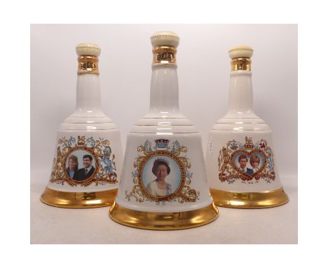 Three Sealed Wade Bells Commemorative Royal Decanters with contents. (3) 