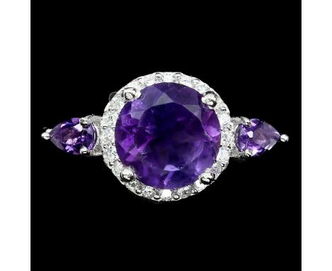 A 925 silver ring set with round and pear cut amethysts, (M).