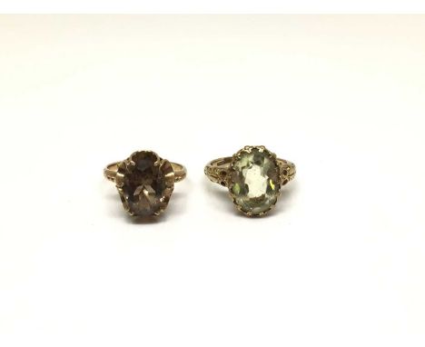 1970s 9ct gold smoky quartz ring (Birmingham 1975), size M½ and one other 9ct gold cocktail ring in an ornate carved setting 