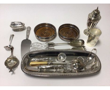 Lot silver plated wares, including a pair of bottle coasters, table lighter, tea strainer, etc