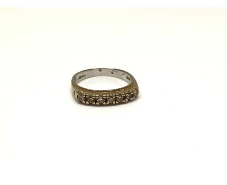 18ct gold diamond seven stone half eternity ring, size MWeight 3.4 grams