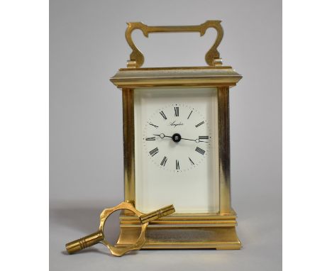 A Late 20th Century Brass Cased English Carriage Clock, With Key but Movement Needs Attention. 12cms High 