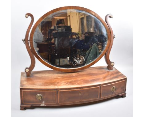 A 19th Century Oval Swing Dressing Table Mirror on Bow Fronted Plinth Base with Three Drawers, Bracket Feet, 62cm wide 