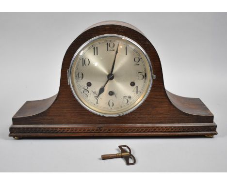 An Oak Westminster Chime Napoleon Hat Mantel Clock, 42cms Wide 