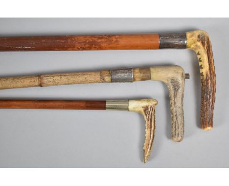 A Collection of Three Vintage Riding Crops to include One with Silver Collar, all with condition Issues 
