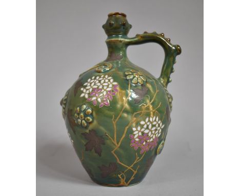 A Hungarian Zsolnay Pecs Majolica Glazed Wine Flask, 21cm high 