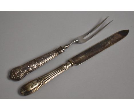 A Silver Handled Bread Knife and Silver Handled Kings Pattern Carving Fork 