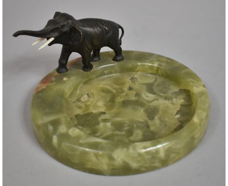 A Mid 20th Century Circular Onyx Dish Mounted with Metal Study of Elephant with Trunk in Salute, in the Austrian Style, 18cms